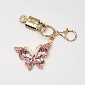 100% Auth Louis Vuitton Lock & Key with unbranded Bagcharm, Keycharm, Keychain